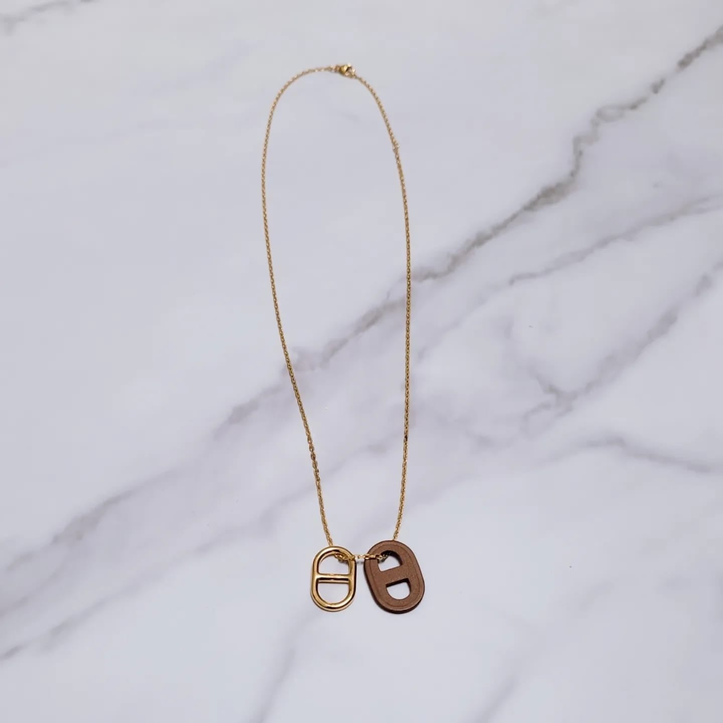 Hermes O'Maillon pendant leather and metal pig nose brown gold necklace