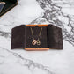 Hermes O'Maillon pendant leather and metal pig nose brown gold necklace